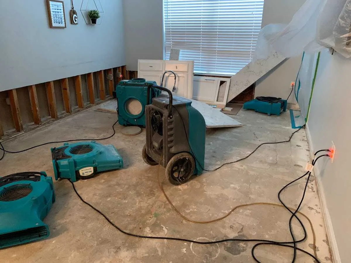 Dehumidifier in flood-cut room for Water Damage Restoration in Valle Vista